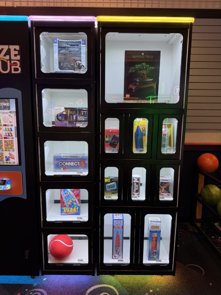 Prize Hub display case stocked with prizes at Rowlett Bowl-A-Rama