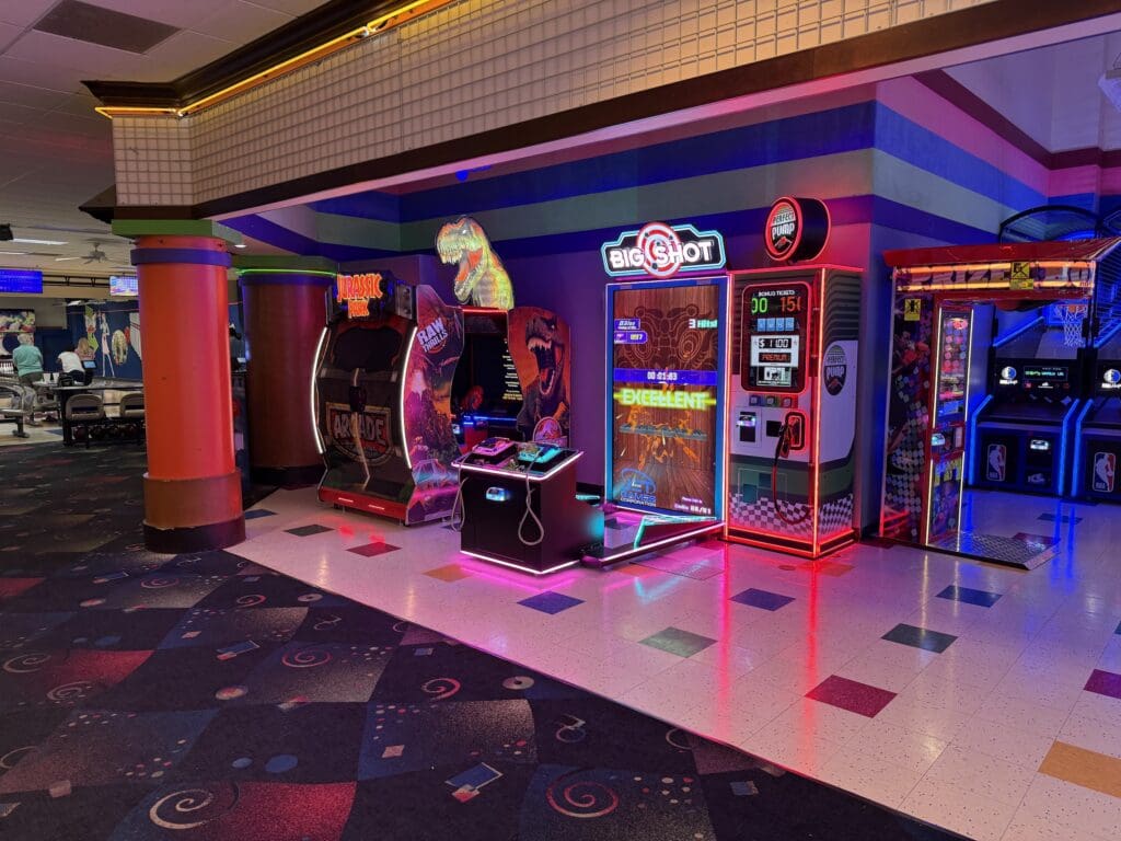 Arcade games including Jurassic Park and Big Shot at Rowlett Bowl-A-Rama
